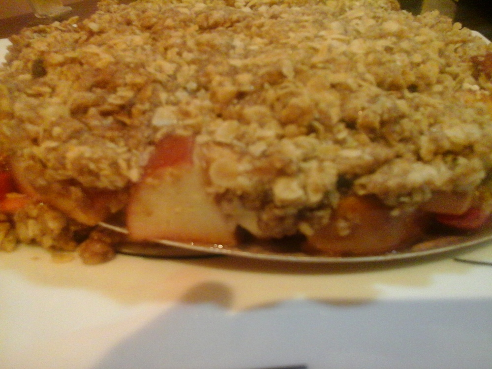 Delicious warm dessert of melt in mouth apple and strawberry with a crispy layer of oats and wheat flour.......